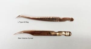 Two rose gold tweezers