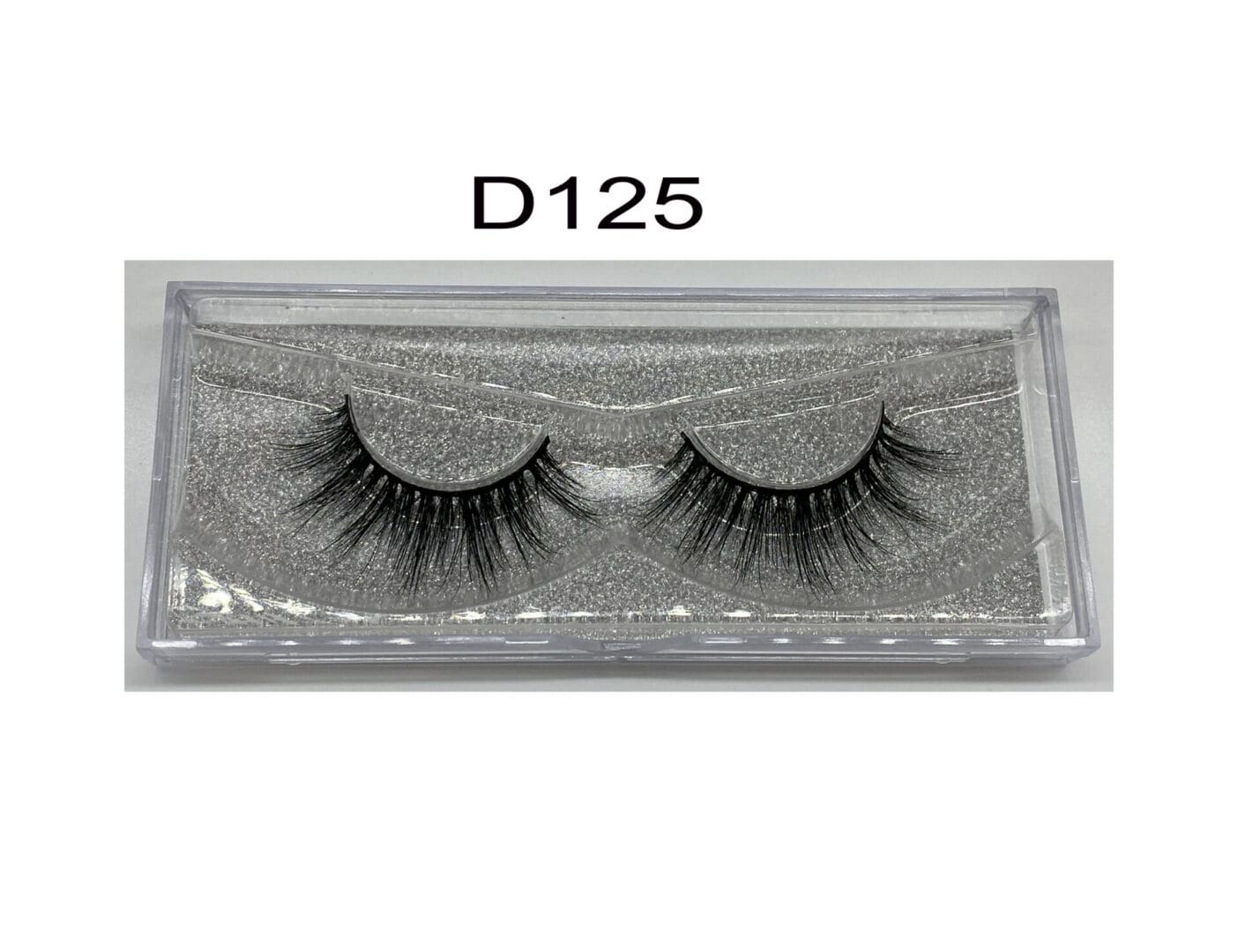 A pair of false eyelashes in a box.