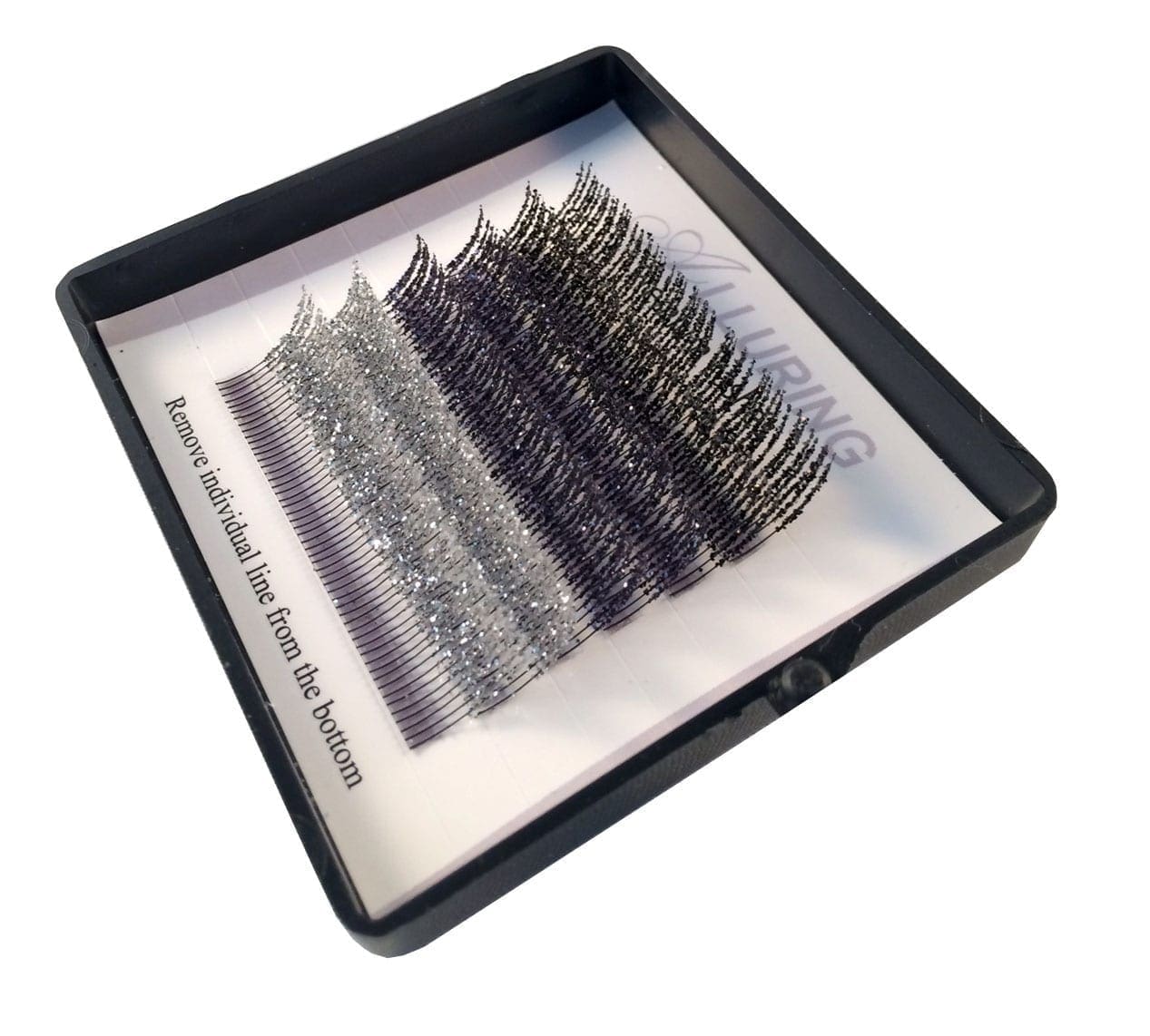 A tray of individual lashes in different colors.