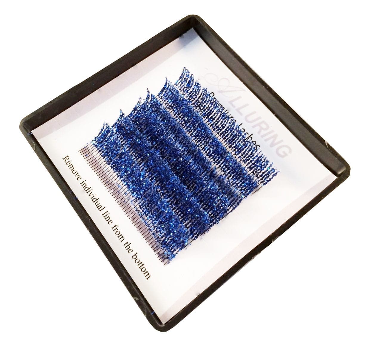 A blue tray of individual lashes in the middle of each other.