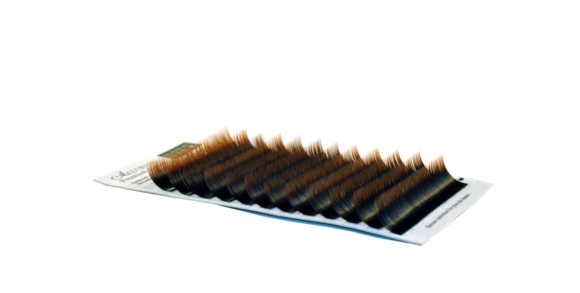A close up of a tray with some brown lashes