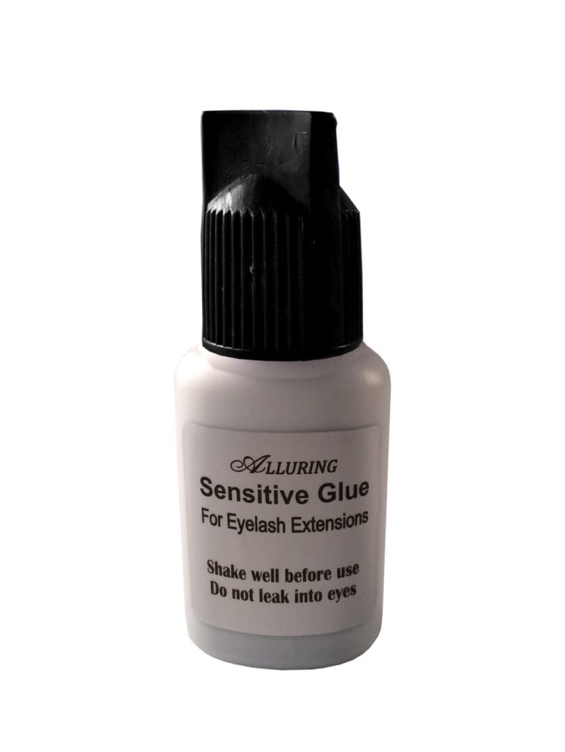 A bottle of eyelash glue with black cap.