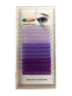 A purple and white box of colored lashes