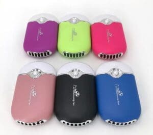 A group of six different colored fans sitting on top of each other.