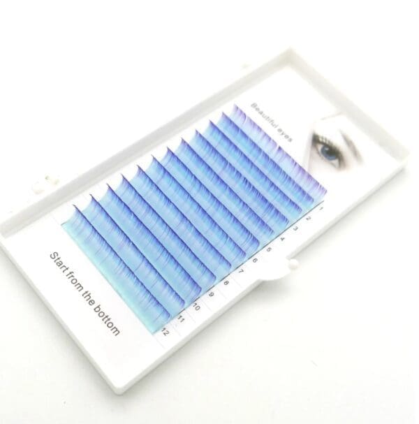 A tray of blue colored individual lashes