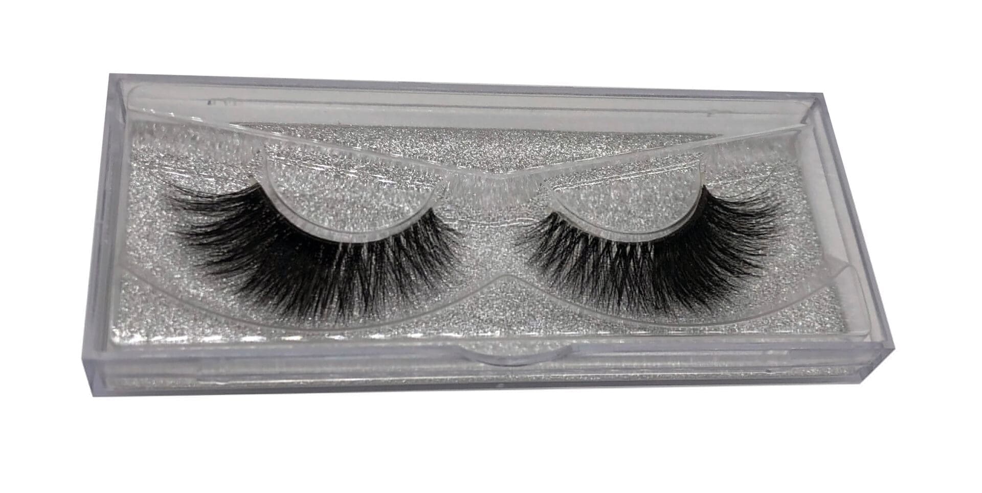 A pair of false eyelashes in silver glitter storage