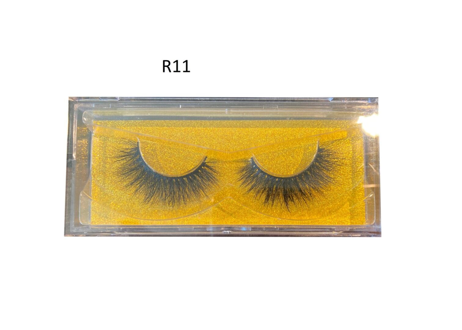 A pair of false eyelashes in a box.