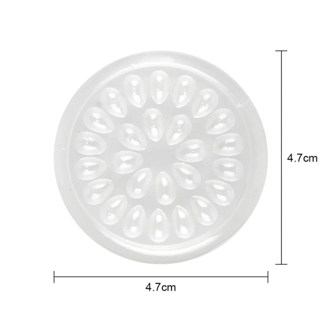 A white plastic plate with a pattern of flowers.