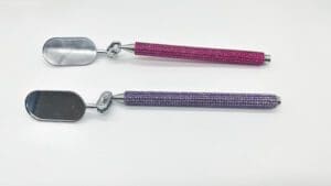 Mirrors with pink and purple handles
