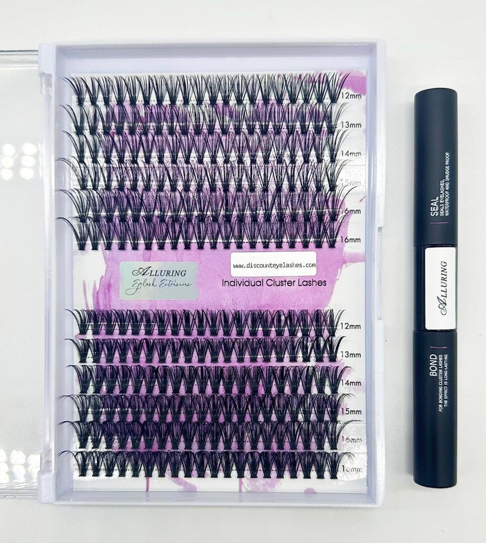 A box of individual lashes with a black pen
