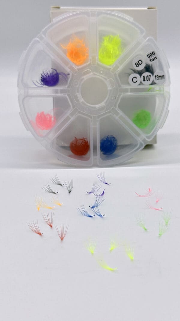 A container of various colors and sizes of fly fishing flies.